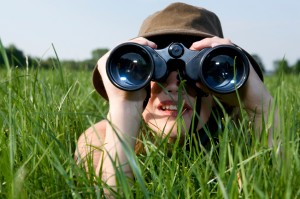 binoculars-in-grass